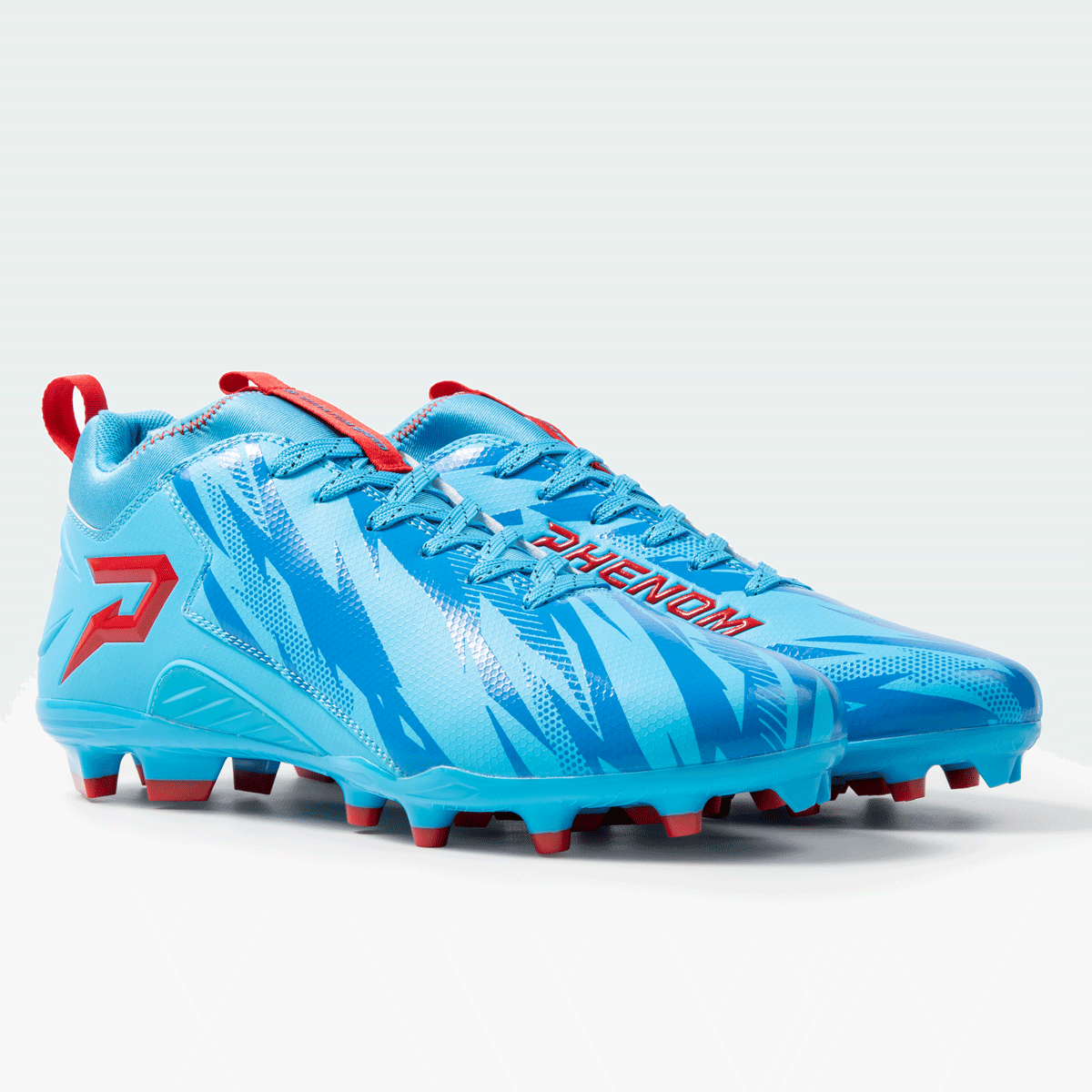 Blue soccer cleats with red accents on a light gray background